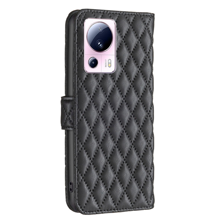 Black leather flip phone case with diamond lattice pattern and camera opening