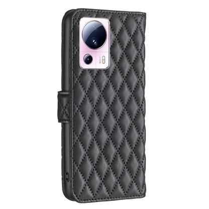 Black leather flip phone case with diamond lattice pattern and camera opening