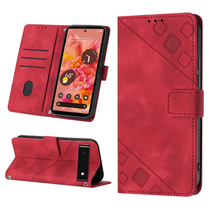 Red embossed leather phone case with folio stand and geometric embossed detail