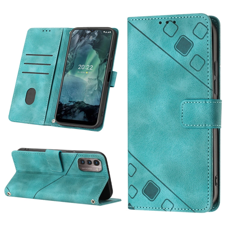 Teal embossed leather folio phone case with stand, card slots, and raised geometric motifs