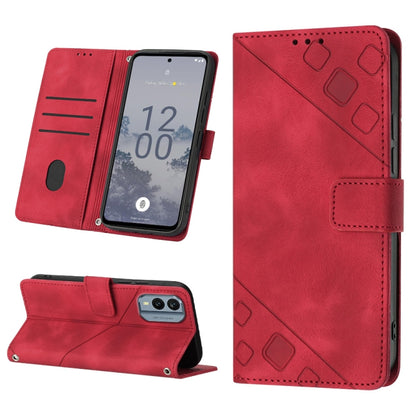 Red embossed leather wallet phone case with kickstand and card slots.