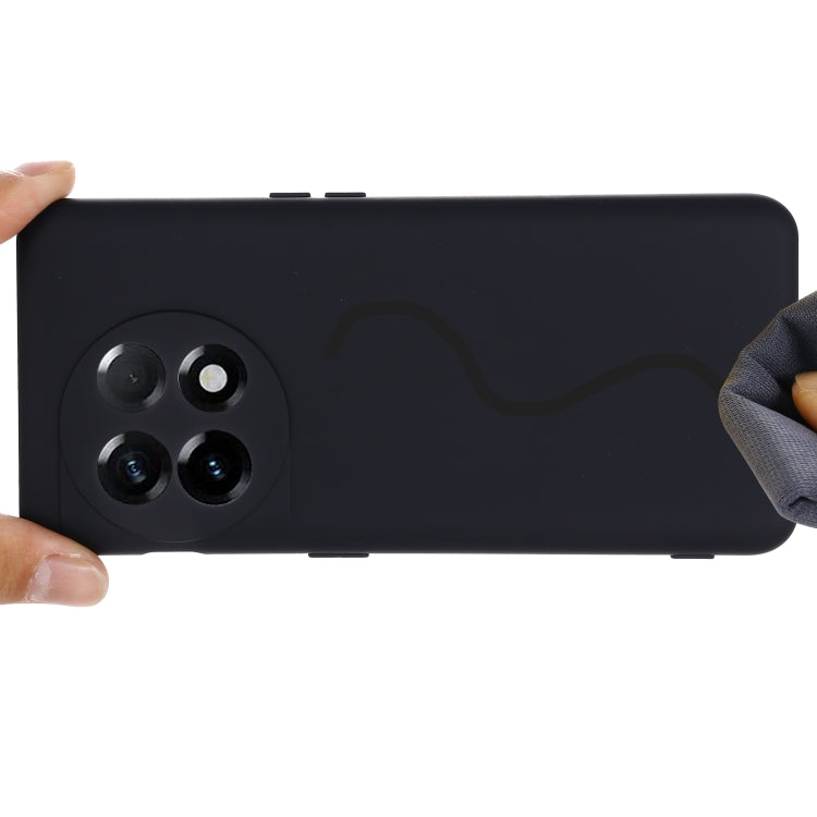 Black liquid silicone full-coverage phone case, side profile with camera cutout