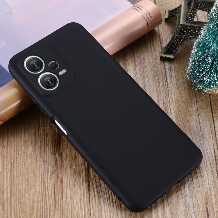 Black liquid silicone full-coverage phone case with raised camera and port cutouts