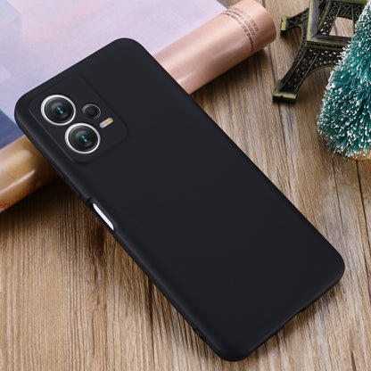 Black liquid silicone full-coverage phone case with raised camera and port cutouts
