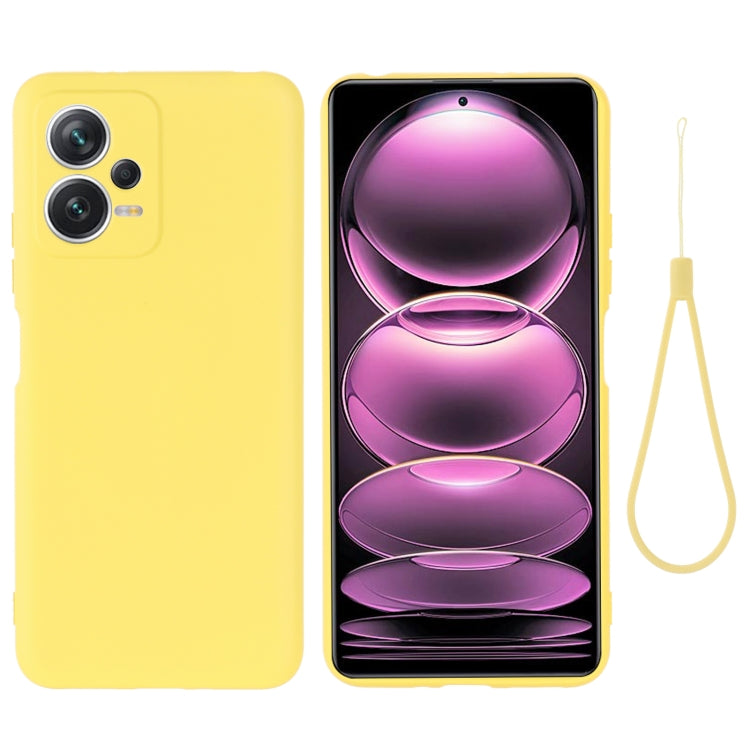 Yellow liquid silicone full-coverage phone case with lanyard and raised camera protection