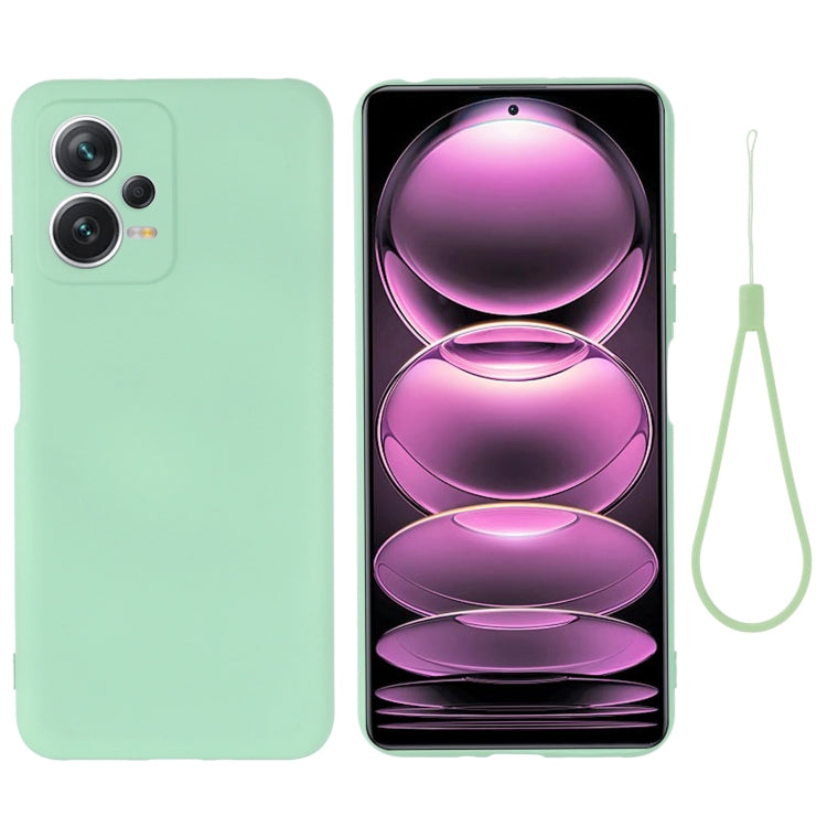 Green liquid silicone full-coverage phone case with lanyard and raised camera protection