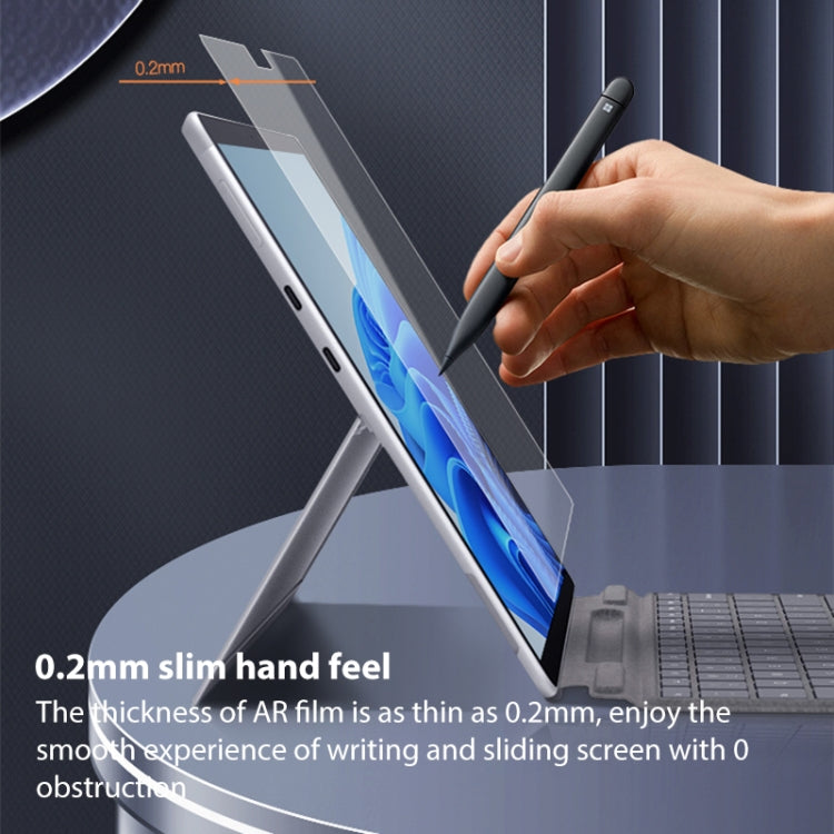 Ultra-thin clear AR screen film on a tablet edge, protecting the display