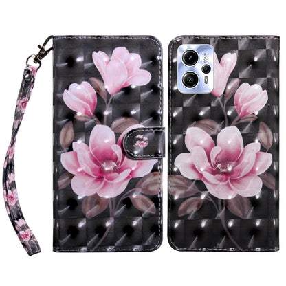 Black leather-look phone case with pink floral 3D artwork and wrist strap; camera cutouts