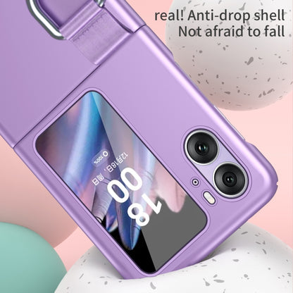 Purple ring-buckle flip phone case close-up with camera lens openings