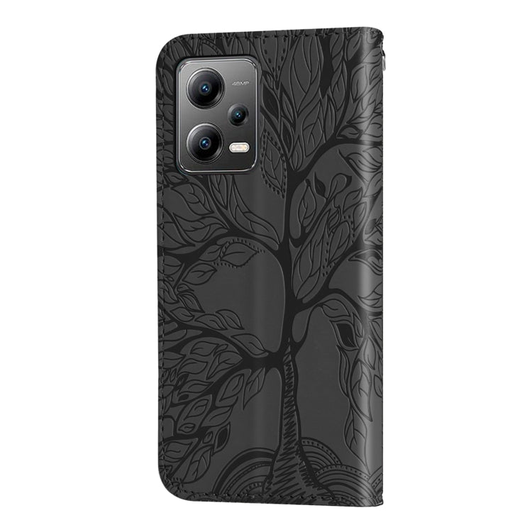 Black embossed leaf pattern phone case with cutouts on the back for cameras and speaker