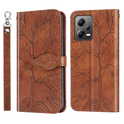 Leather phone case with embossed tree pattern, brown, with wrist strap