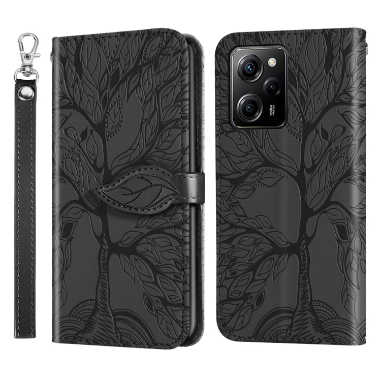Black embossed leaf pattern wallet phone case with wrist strap, front flip and back