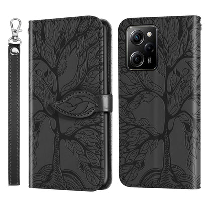 Black embossed leaf pattern wallet phone case with wrist strap, front flip and back