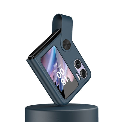 Dark blue leather-style phone case with hand strap and circular camera ring details
