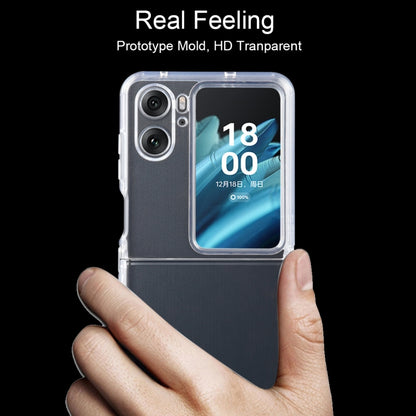 Clear TPU phone case with camera cutouts, held in a hand for a close look