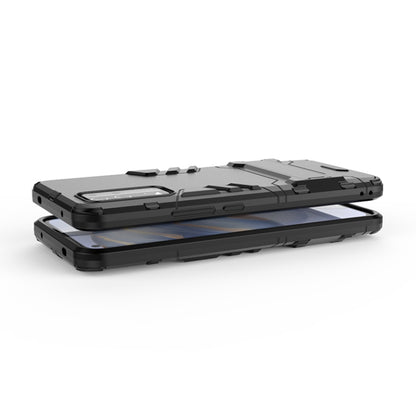 Black rugged protective phone case with raised screen and camera lip, side profile