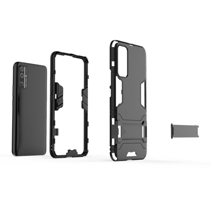 Black phone case with separate frame and back pieces, cutouts for camera and buttons