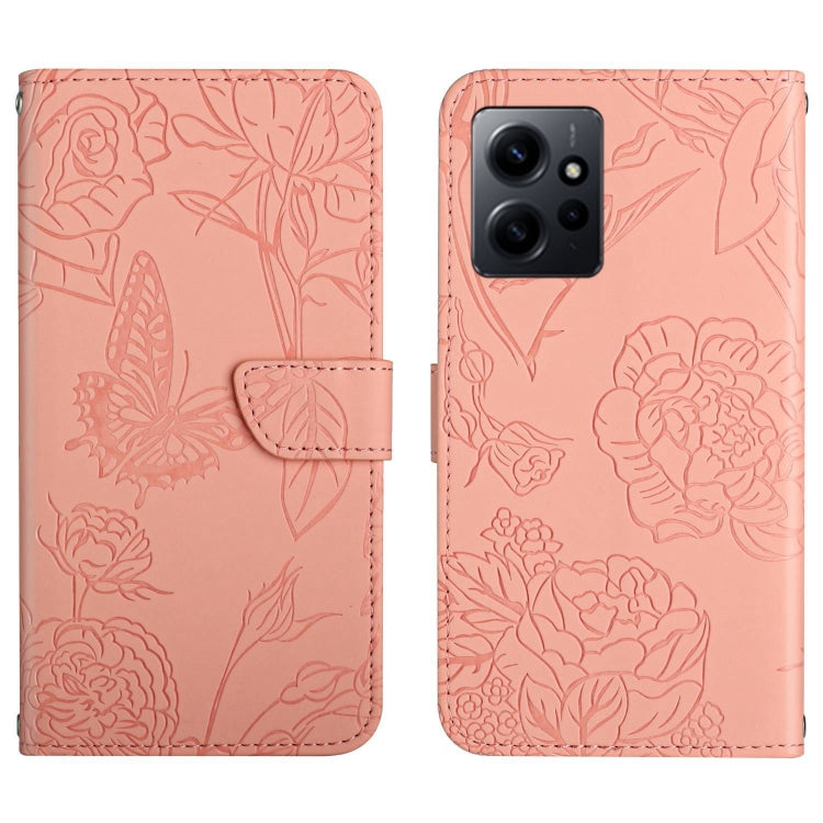 Pink butterfly-embossed flip leather phone case with camera cutout and front strap