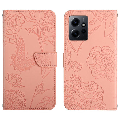 Pink butterfly-embossed flip leather phone case with camera cutout and front strap