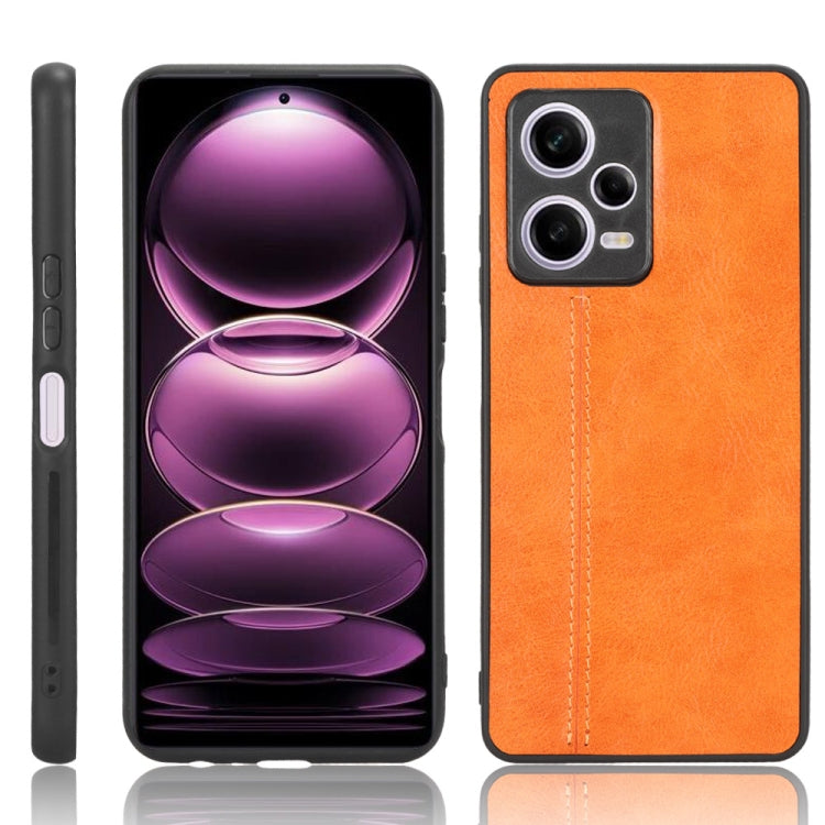 Orange textured faux leather phone case with camera cutouts and side button openings