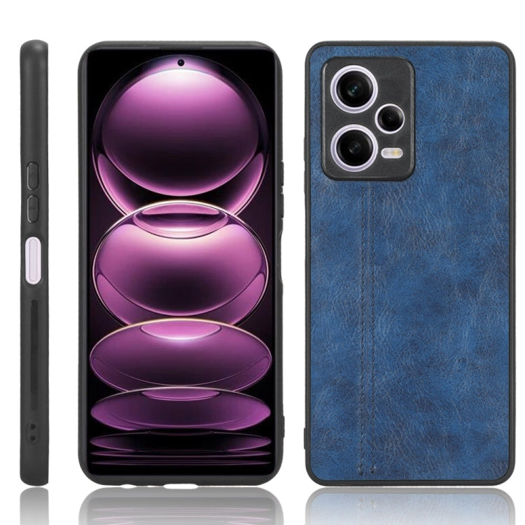 Blue textured faux leather phone case with camera cutouts and side button openings