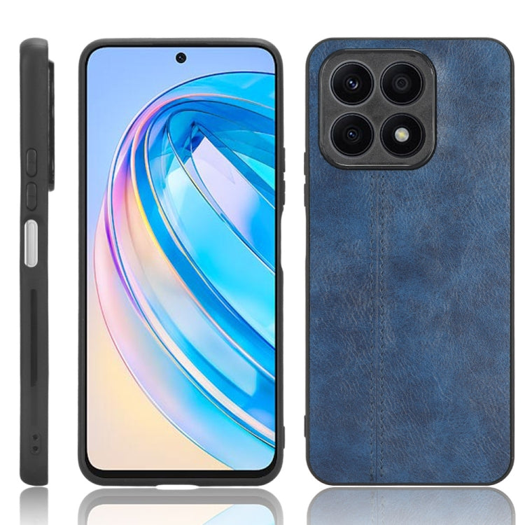 Textured blue leather-style phone case with multiple camera cutouts and edges