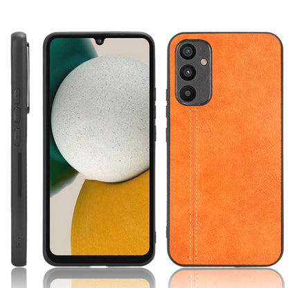 Orange leather-look phone case with stitched edge and cutouts for camera and ports