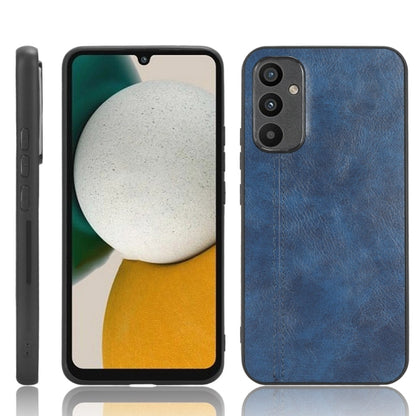 Blue leather-look phone case with stitched edge and cutouts for camera and ports