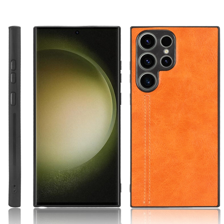 Orange leather-look phone case with triple camera cutouts and stitched edge