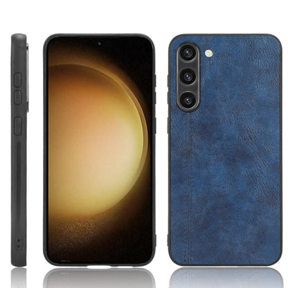 Blue leather-look phone case with textured finish and camera cutouts