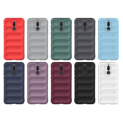 Assorted TPU phone cases in multiple colors, each with ridged back design