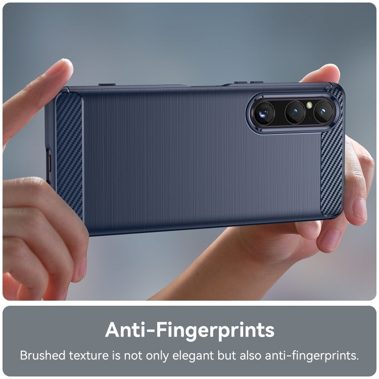 Blue phone case with brushed texture, carbon-fiber patch, and triple-camera cutout