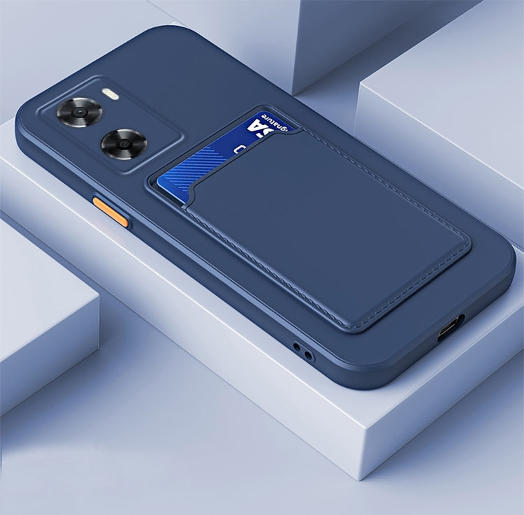 Dark blue TPU phone case with contrast card slot and button-style camera cutouts
