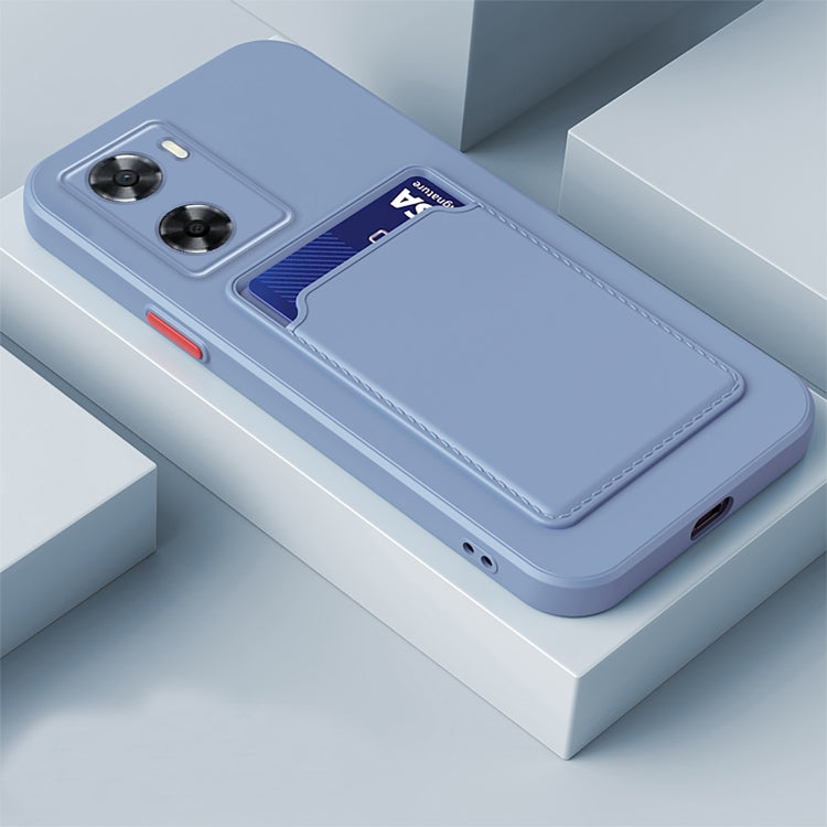 Gray TPU phone case with contrast card slot and button-style camera cutouts