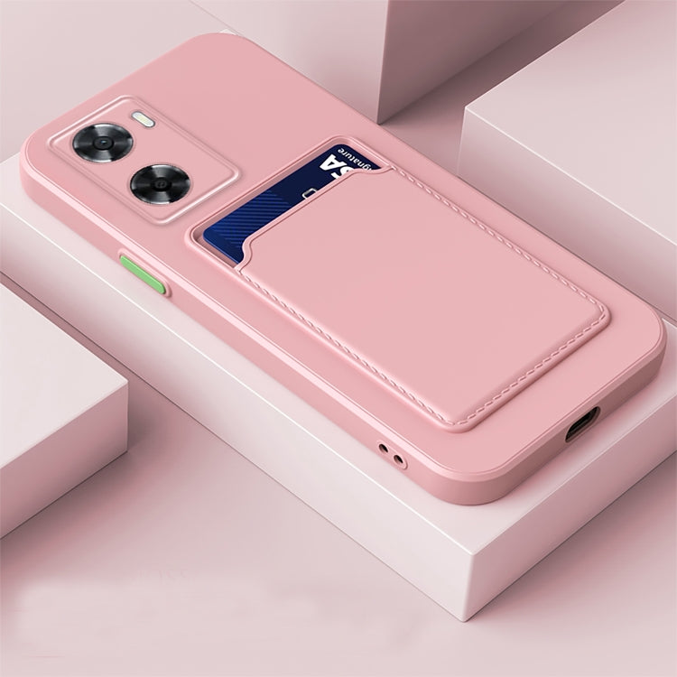 Pink TPU phone case with contrast card slot and button-style camera cutouts