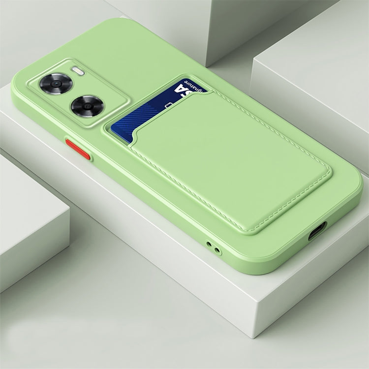 Green TPU phone case with contrast card slot and button-style camera cutouts