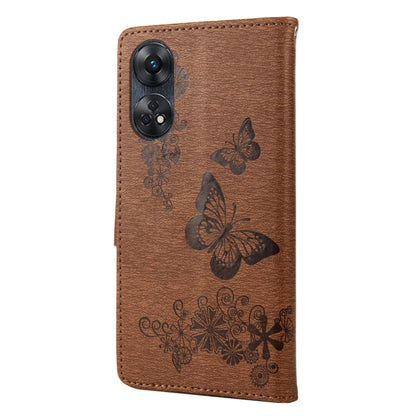 Brown butterfly embossed leather phone case with camera cutout