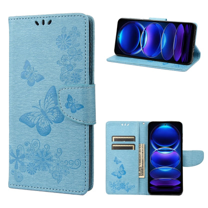 Light blue flip leather phone case with embossed butterfly pattern and side clasp