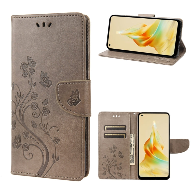 Brown leather phone case with butterfly-flower pattern and magnetic fold-over strap