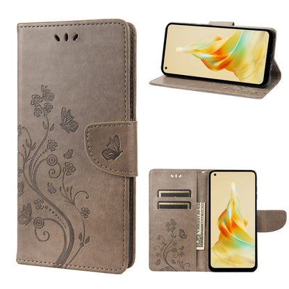 Brown leather phone case with butterfly-flower pattern and magnetic fold-over strap