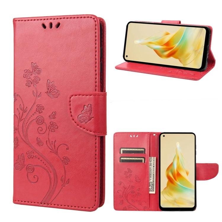 Red leather phone wallet case with embossed butterfly-and-flower pattern, folio stand, card slots