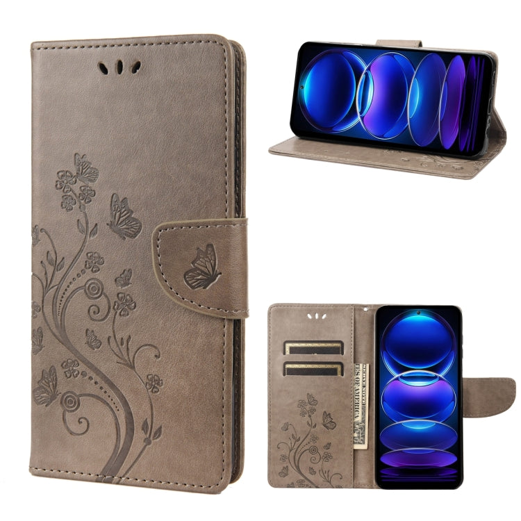 Light gray leather folio phone case with embossed butterflies and flowers, front flap, card holder