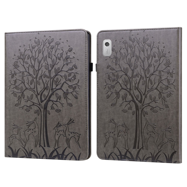 Grey embossed leather-style tablet case with tree and deer pattern, front cover closed