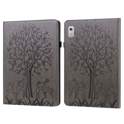 Grey embossed leather-style tablet case with tree and deer pattern, front cover closed