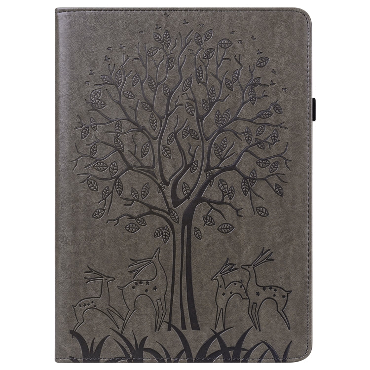 Grey embossed leather-style tablet case with tree and deer pattern, front view