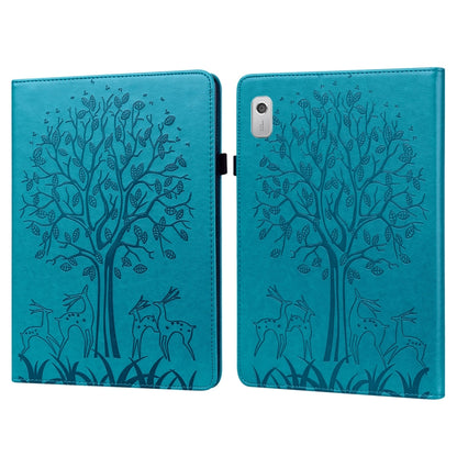 Blue embossed leather-style tablet case with tree and deer pattern, front cover closed