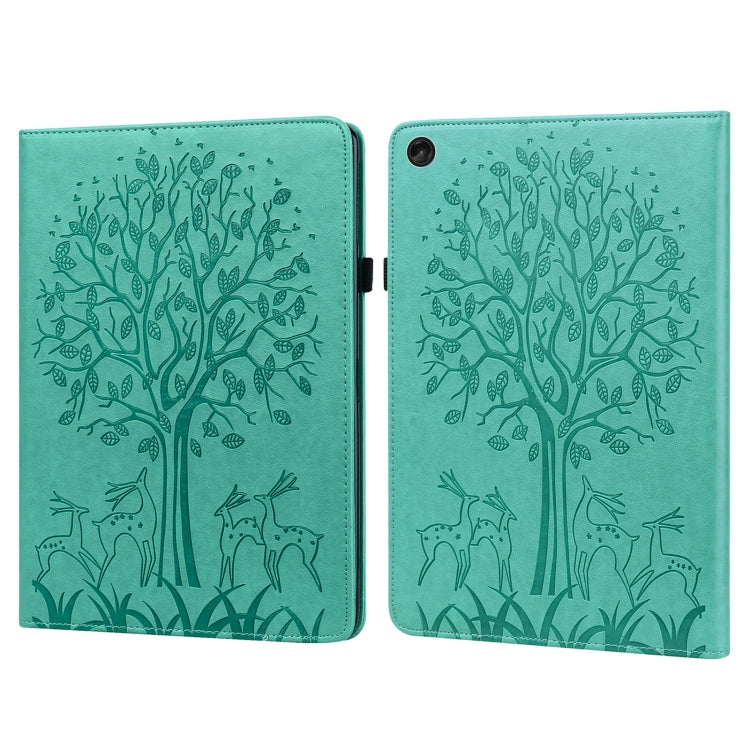 Green embossed leather-style tablet case with tree and deer pattern, front cover closed