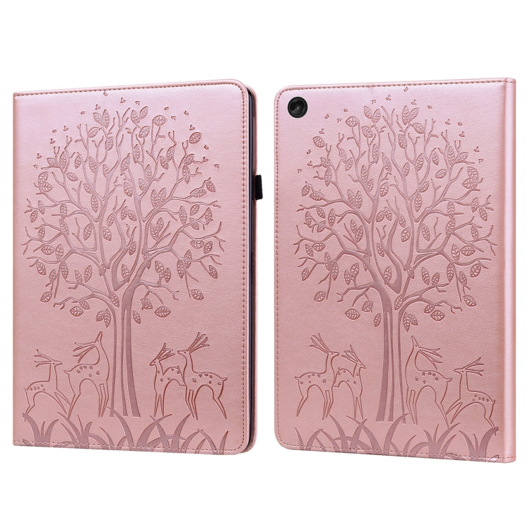 Pink embossed leather tablet case with tree and deer pattern, foldover cover