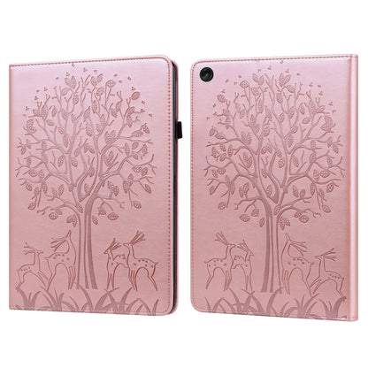 Pink embossed leather tablet case with tree and deer pattern, foldover cover