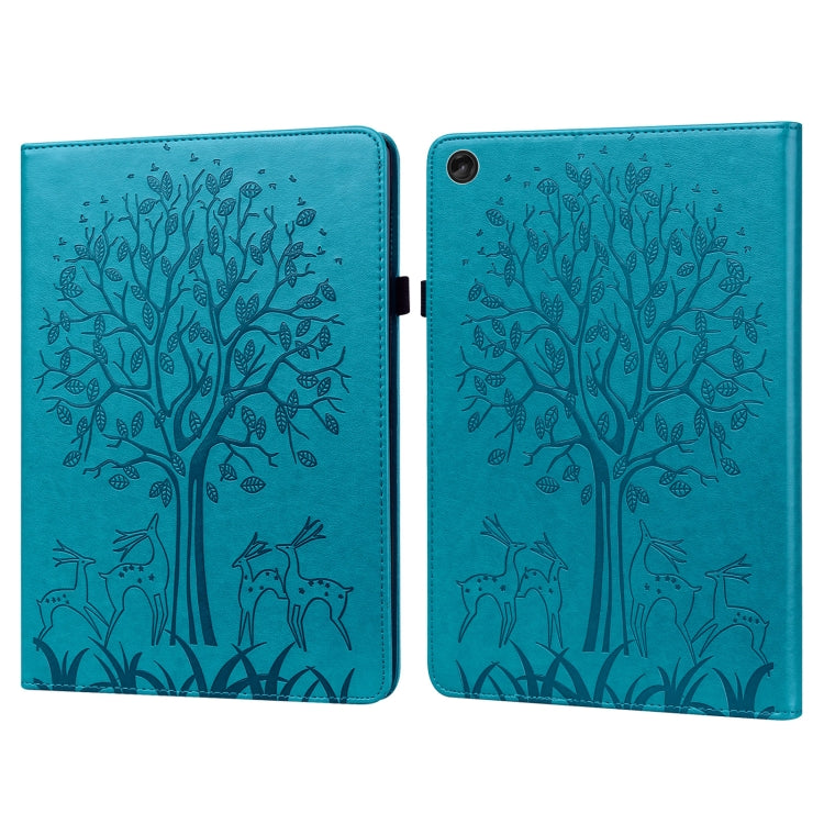 Blue embossed leather tablet case with tree and deer pattern, foldover cover